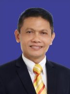 A person in a suit and tieDescription automatically generated with medium confidence
